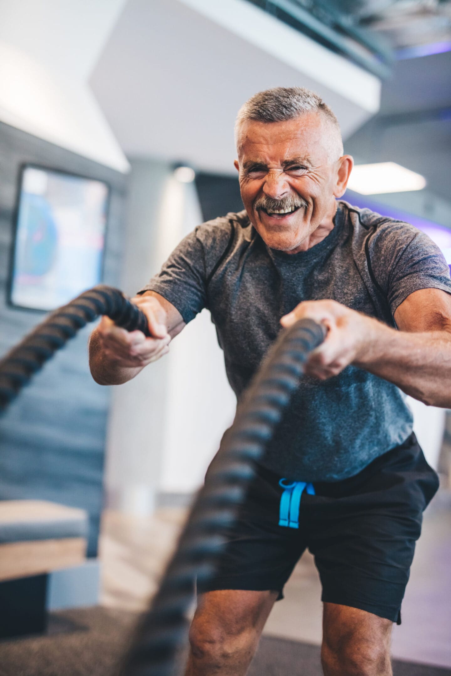 Senior man working out intensely