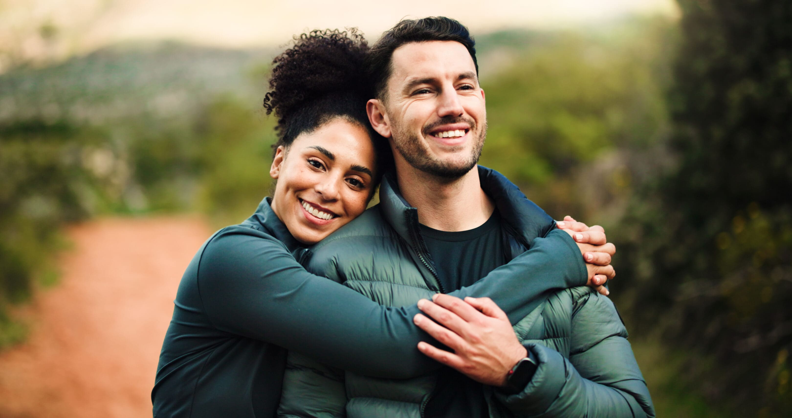 Smiling pair in casual outdoor setting