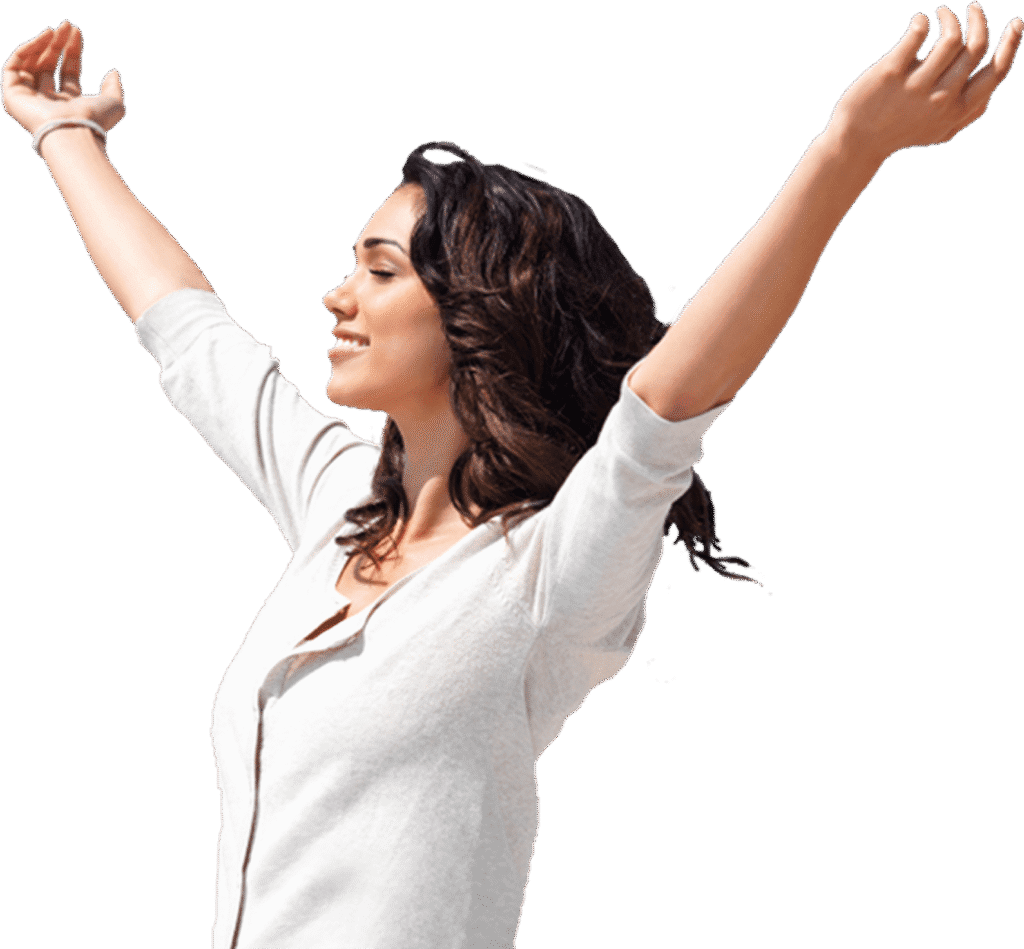 Woman with arms raised, smiling joyfully