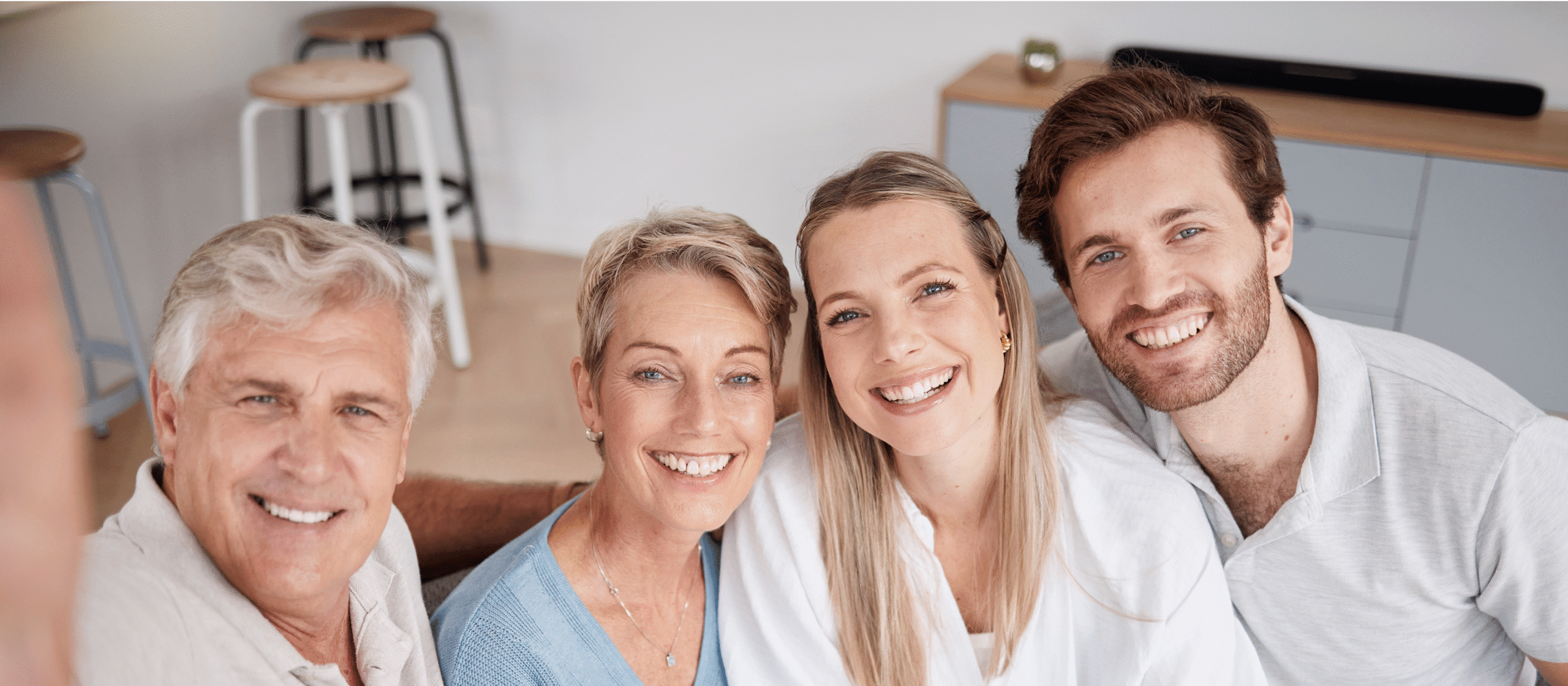 Smiling family posing for a selfie