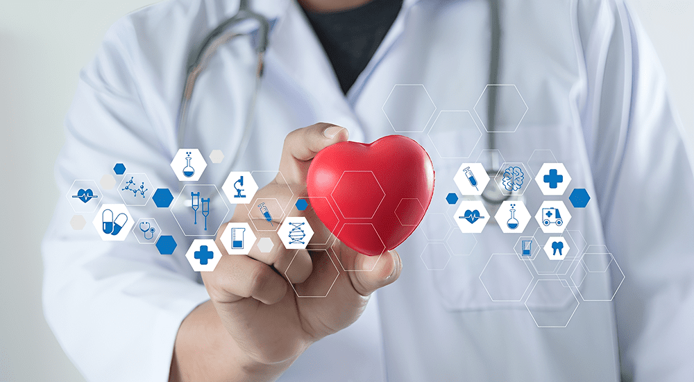 Doctor holding heart model, healthcare icons displayed.