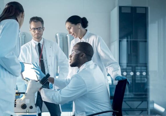 Group of lab professionals collaborating